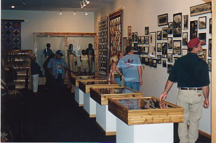 three rooms full of photos